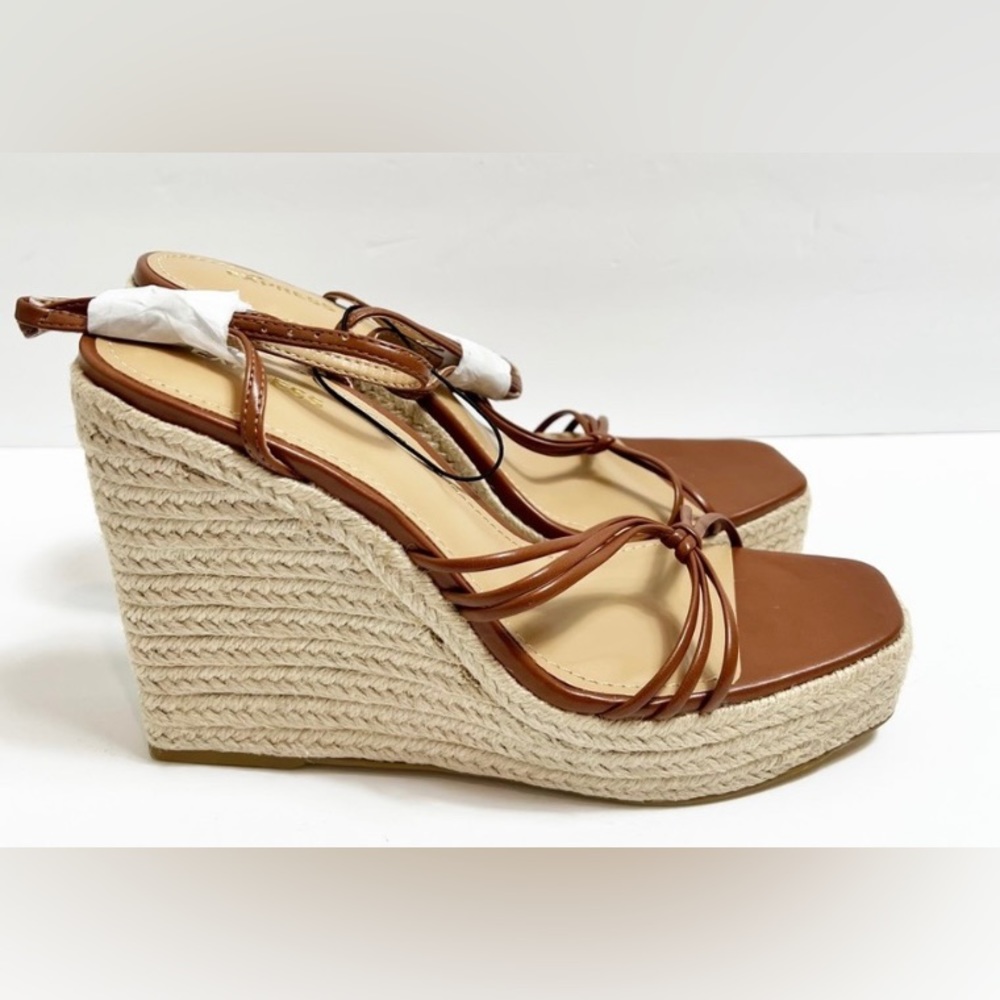 Sandals wedge xpress Strappy Wedge Square Toe Sandals
Size: 6
Color: Cognac